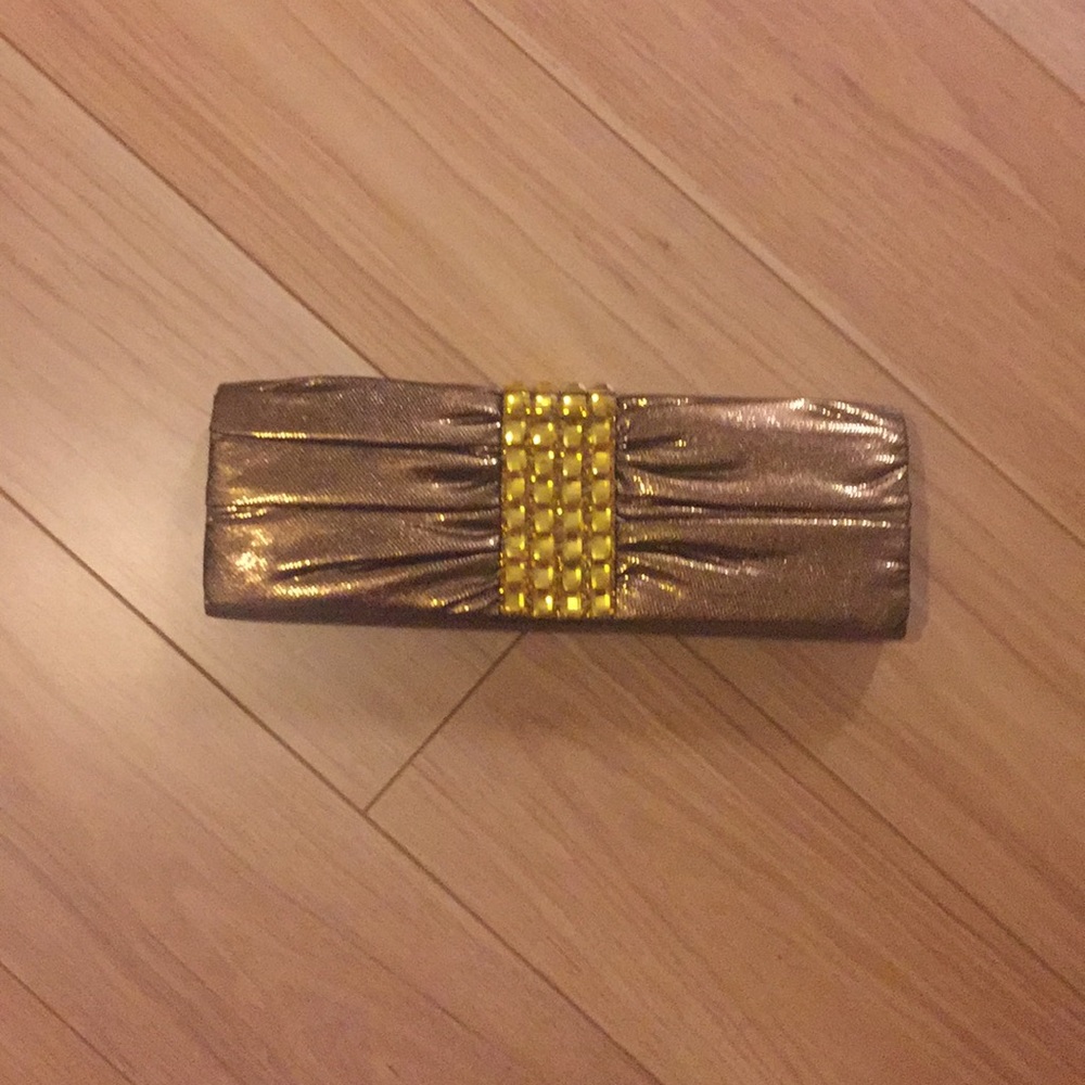 Metallic gold clutch bag